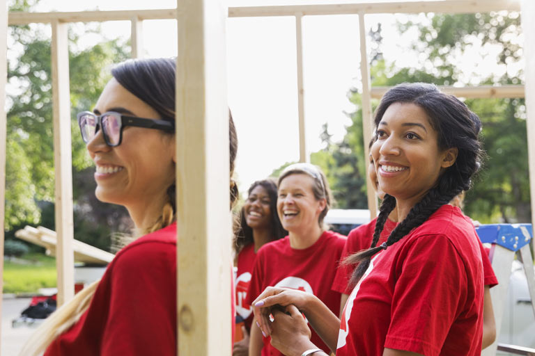 students working at a habitat for humanity site